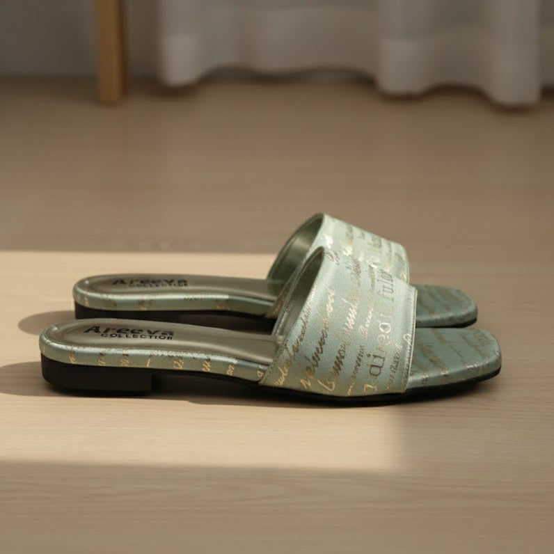 Pair of green slides with text on a wooden surface