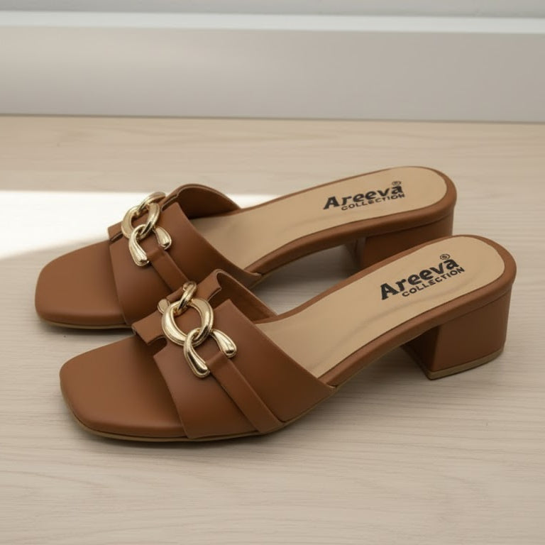 Brown sandal with a gold buckle on a beige background